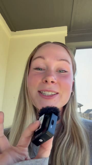 Talking head reel: a creator speaking to camera with a handheld mic